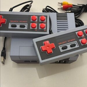Classic Gaming Console with Dual Gray and Red Controllers